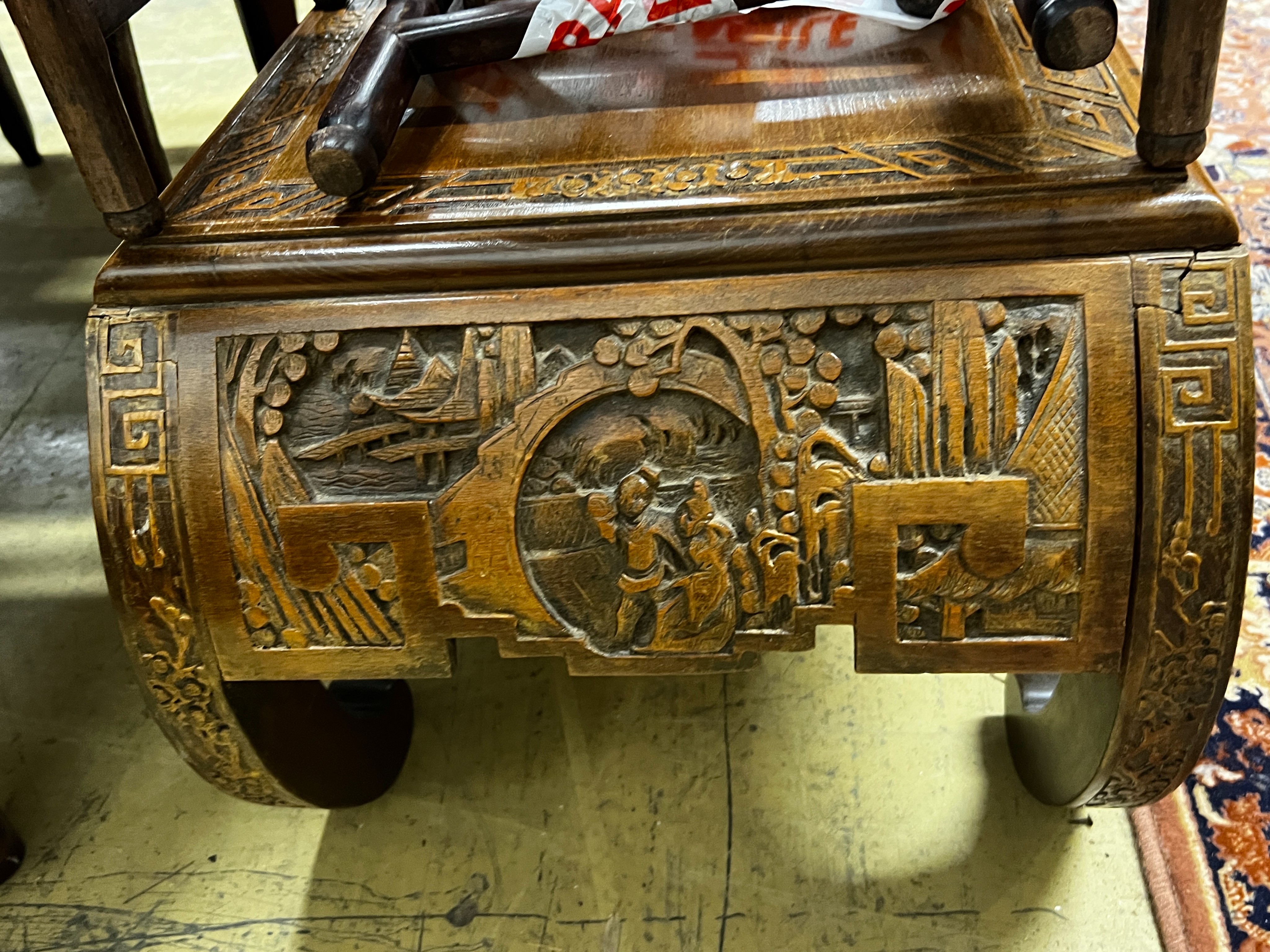 A Chinese carved hardwood low table, length 89cm, depth 43cm, height 36cm together with three Chinese carved hongmu occasional tables (one in need of extensive repair)